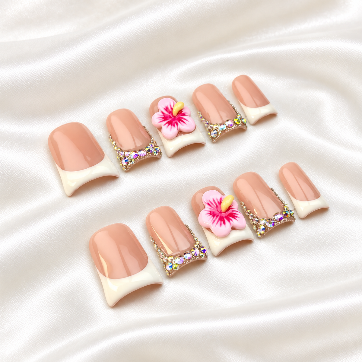Hibiscus Veil press-on nails - Pink hibiscus flowers, ivory French tips and iridescent crystal accents - opposite angled view