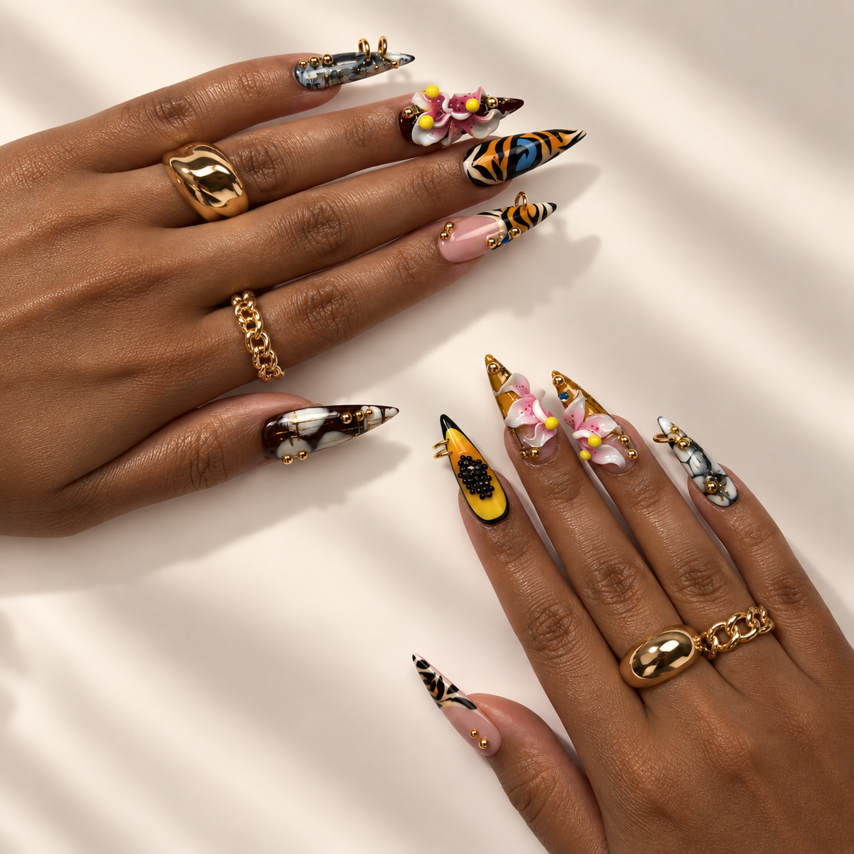 Tiger Lily press-on nails worn on hands