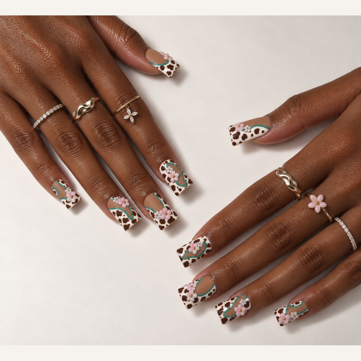 Wild Canvas press-on nails worn on hands